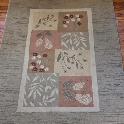 Area rug with a matching throw rug