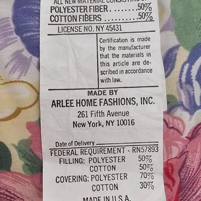 Three wedge pillows with a Chenille Bedspread