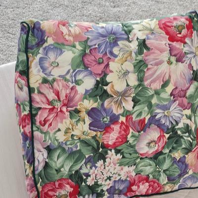 Three wedge pillows with a Chenille Bedspread