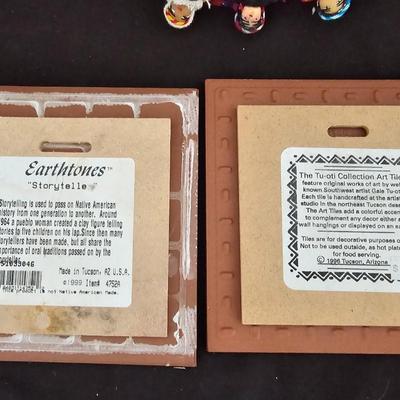 Two Trivets - Earthtones storytelle and Tu-oti art tile with circle of friend's hand sewed dolls