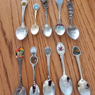 Collectible Souvenir spoons with wooden display rack