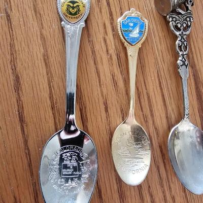Collectible Souvenir spoons with wooden display rack