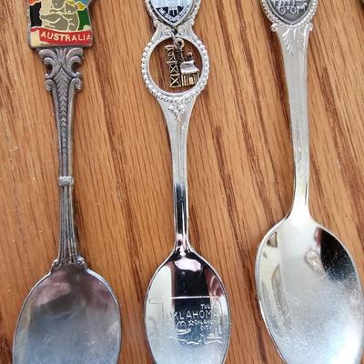 Collectible Souvenir spoons with wooden display rack