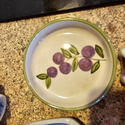 Tea pot with porcelain napkin rings - linens and an assortment of crock like dishware