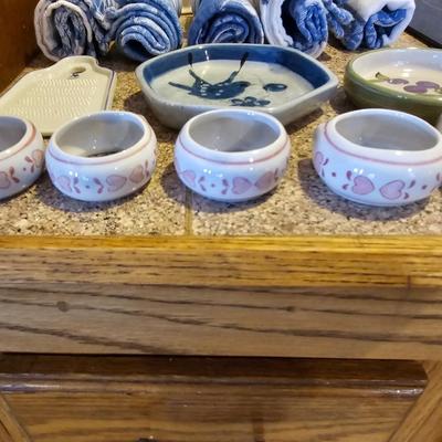Tea pot with porcelain napkin rings - linens and an assortment of crock like dishware