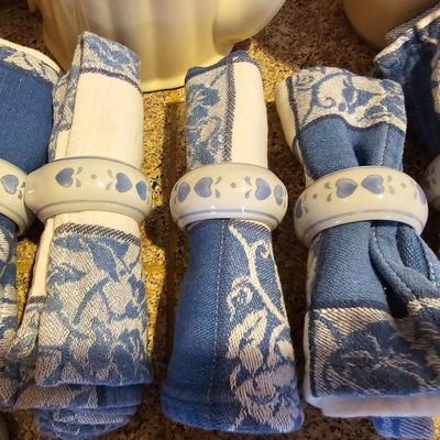 Tea pot with porcelain napkin rings - linens and an assortment of crock like dishware