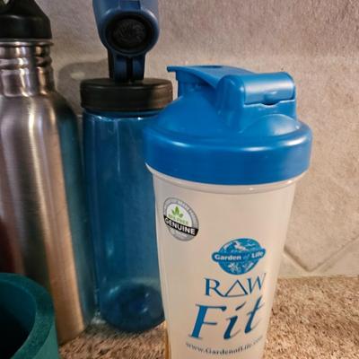 Stainless drink vessels = plastic drink cups and a koozie