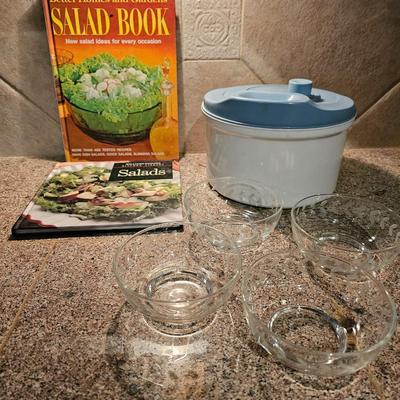 Salad spinner with salad cookbooks and small etched glass salad bowls