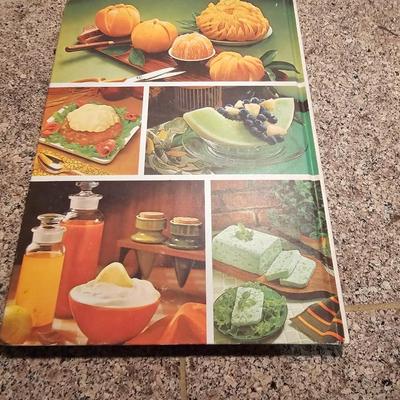 Salad spinner with salad cookbooks and small etched glass salad bowls