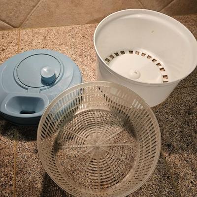 Salad spinner with salad cookbooks and small etched glass salad bowls