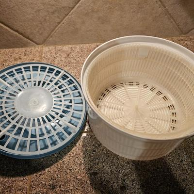 Salad spinner with salad cookbooks and small etched glass salad bowls