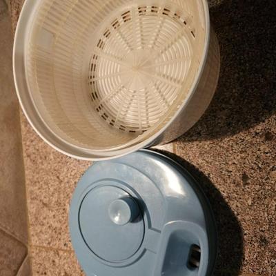 Salad spinner with salad cookbooks and small etched glass salad bowls