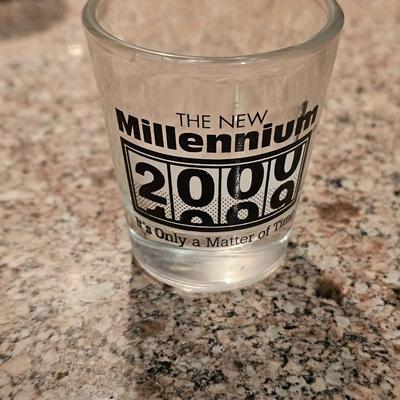 Hamilton Beach drink mixer with an assortment of shot glasses and more