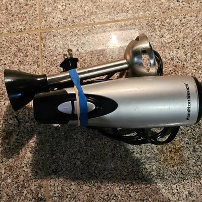 Hamilton Beach drink mixer with an assortment of shot glasses and more