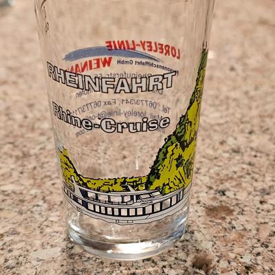 Hamilton Beach drink mixer with an assortment of shot glasses and more