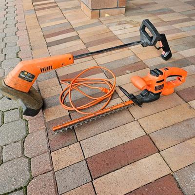 Black & Decker electric weed eater and an electric trimmer with extension cord