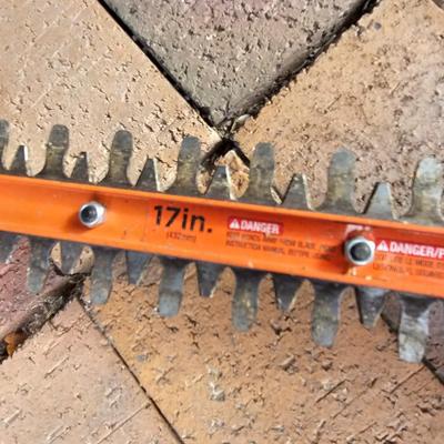 Black & Decker electric weed eater and an electric trimmer with extension cord