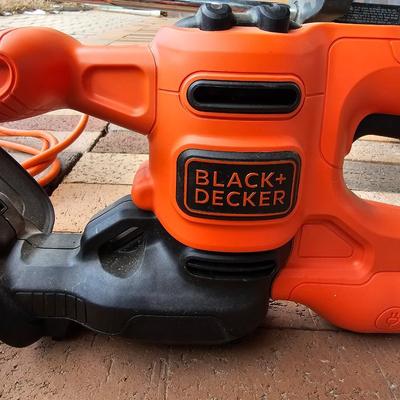 Black & Decker electric weed eater and an electric trimmer with extension cord
