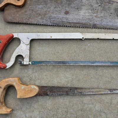 Assortment of hand saws with a wooden Buck Bros. 12" Mitre box