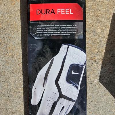 Three new boxes Callaway golf balls and a new pair of dura feel XL gold gloves