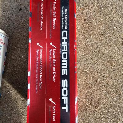 Three new boxes of golf balls and two pair of lightly used gloves