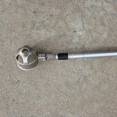 Golf balls with advertisements and a ball grabber