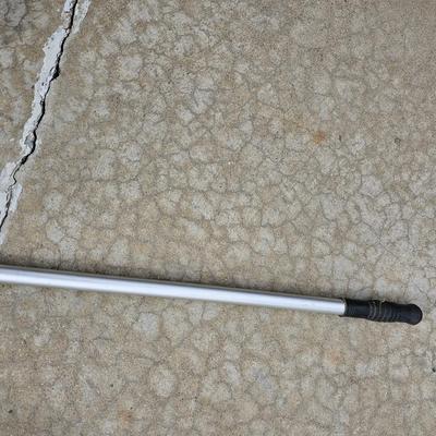 Golf balls with advertisements and a ball grabber