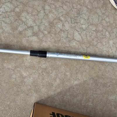 Golf balls with advertisements and a ball grabber