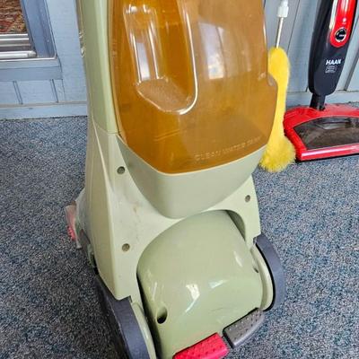Bissell carpet cleaner - small Haan vacuum and a duster brush
