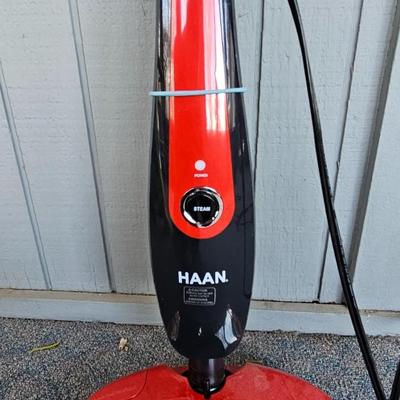Bissell carpet cleaner - small Haan vacuum and a duster brush