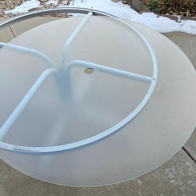 Outdoor patio table with 4 cushioned chairs