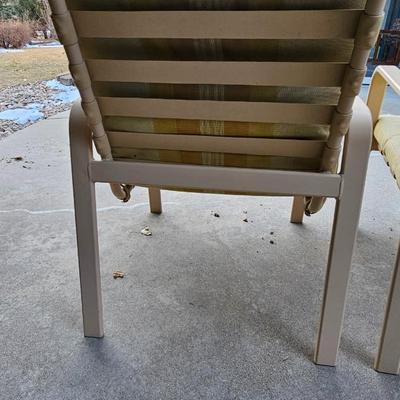 Outdoor patio table with 4 cushioned chairs