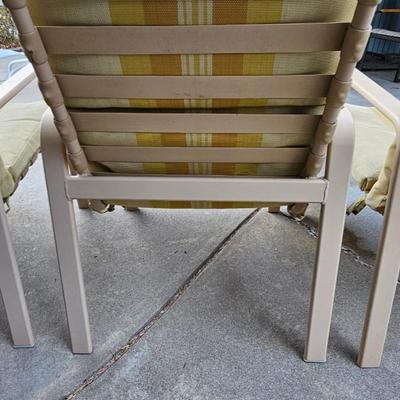 Outdoor patio table with 4 cushioned chairs