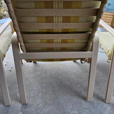 Outdoor patio table with 4 cushioned chairs
