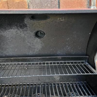 BBQ-Pro Outdoor grill with rotisserie and other cooking utensils