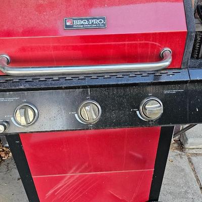 BBQ-Pro Outdoor grill with rotisserie and other cooking utensils