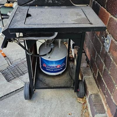 BBQ-Pro Outdoor grill with rotisserie and other cooking utensils