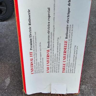 BBQ-Pro Outdoor grill with rotisserie and other cooking utensils