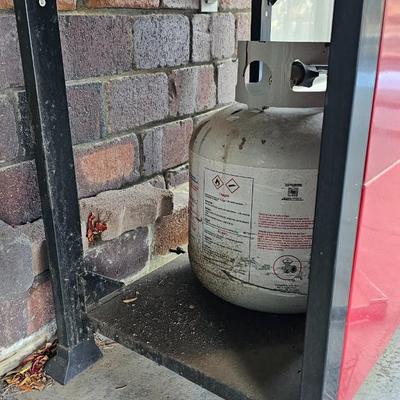 BBQ-Pro Outdoor grill with rotisserie and other cooking utensils