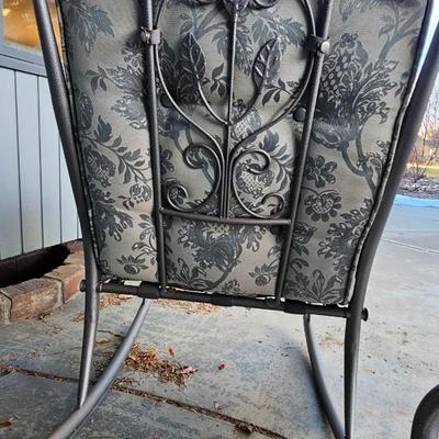 Two metal framed -Grey outdoor rocking chairs with wooden table