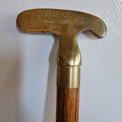 His golf club handled and Hers canes