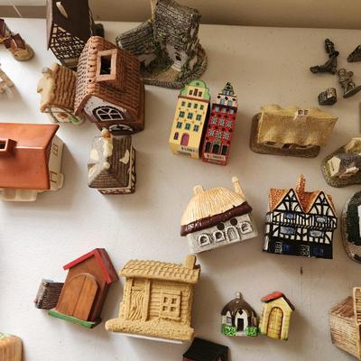 Large Table lot of Collectibles Small Buildings, Clock, Wall hooks, Occupied Japan items, KLM Dutch Airlines Houses