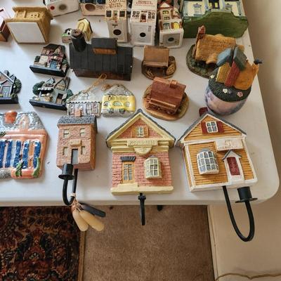 Large Table lot of Collectibles Small Buildings, Clock, Wall hooks, Occupied Japan items, KLM Dutch Airlines Houses