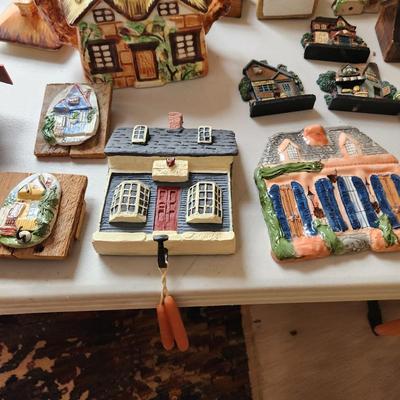 Large Table lot of Collectibles Small Buildings, Clock, Wall hooks, Occupied Japan items, KLM Dutch Airlines Houses