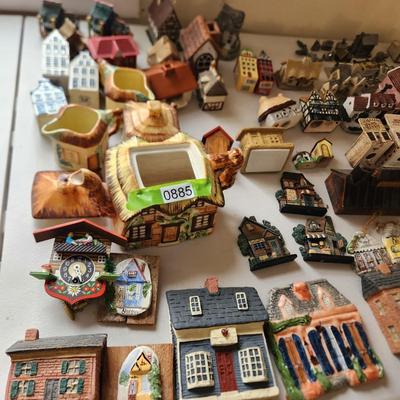 Large Table lot of Collectibles Small Buildings, Clock, Wall hooks, Occupied Japan items, KLM Dutch Airlines Houses