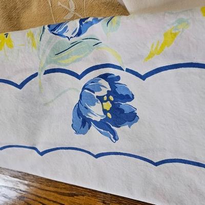 Large variety of rectangle tablecloths and placemats and furniture throws