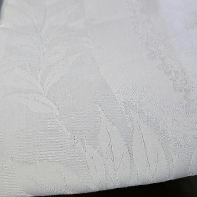 Large variety of rectangle tablecloths and placemats and furniture throws