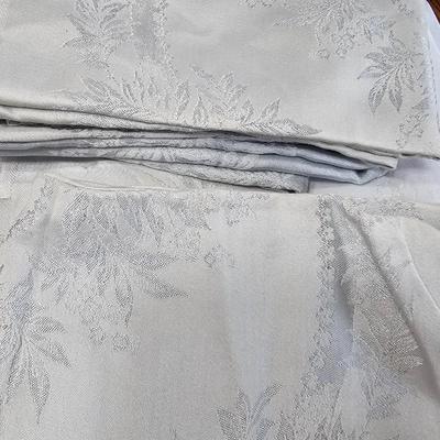 Large variety of rectangle tablecloths and placemats and furniture throws