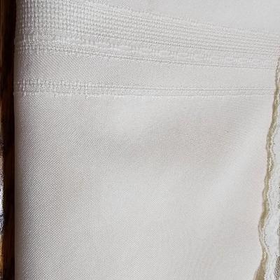 Large variety of rectangle tablecloths and placemats and furniture throws