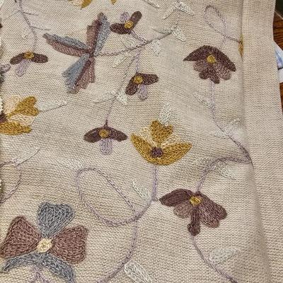 Large variety of rectangle tablecloths and placemats and furniture throws